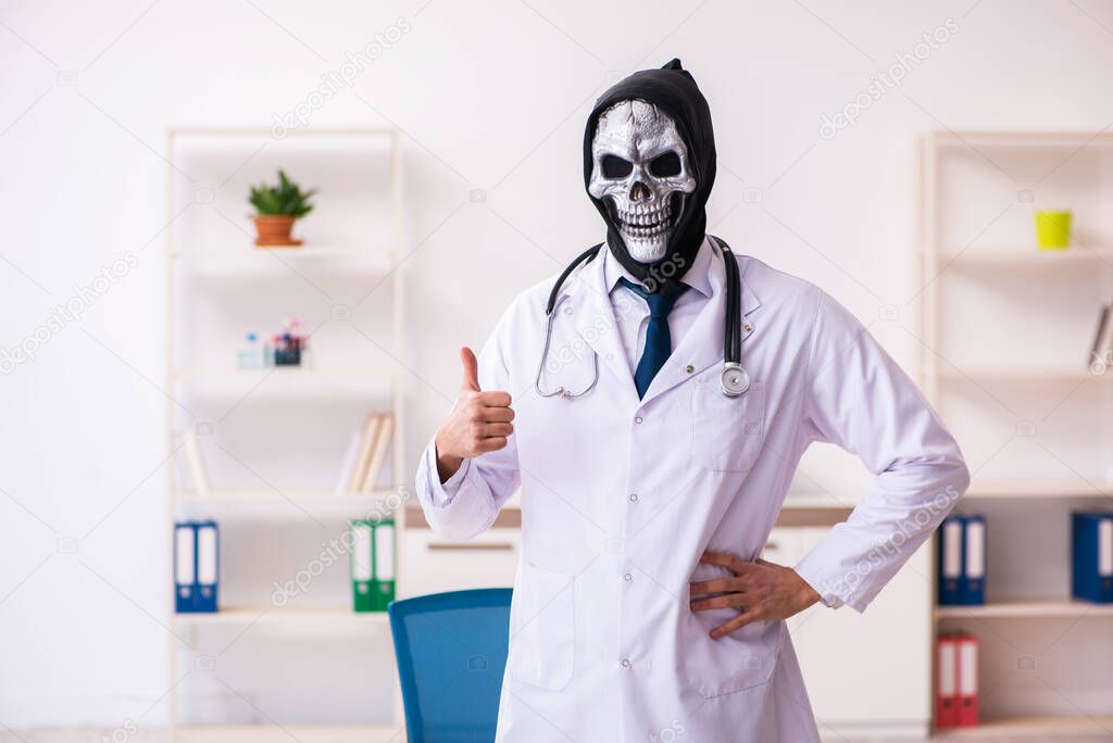 Male devil doctor working in the clinic