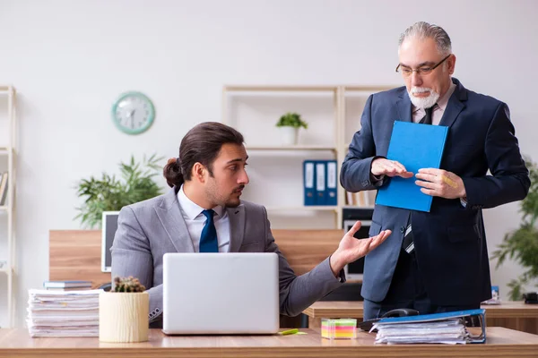 Two employees in pandemic concept at workplace — Stock Photo, Image