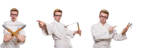 Funny karate fighter with nunchucks on white — Stock Photo, Image