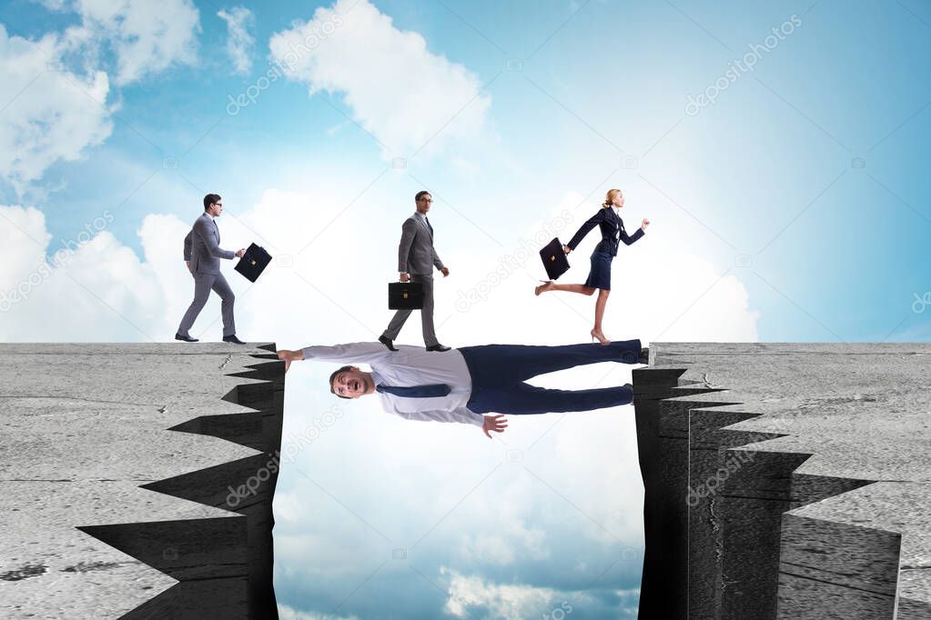 Businessman acting as a bridge in support concept