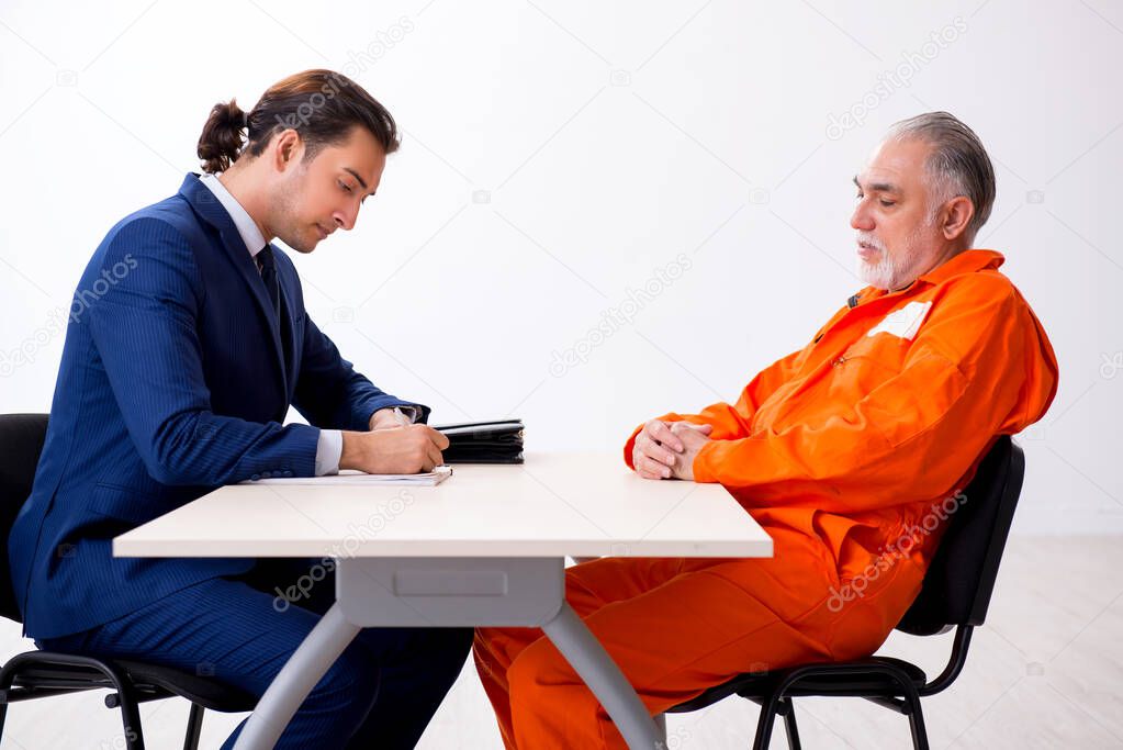 Old captive meeting with advocate in pre-trial detention