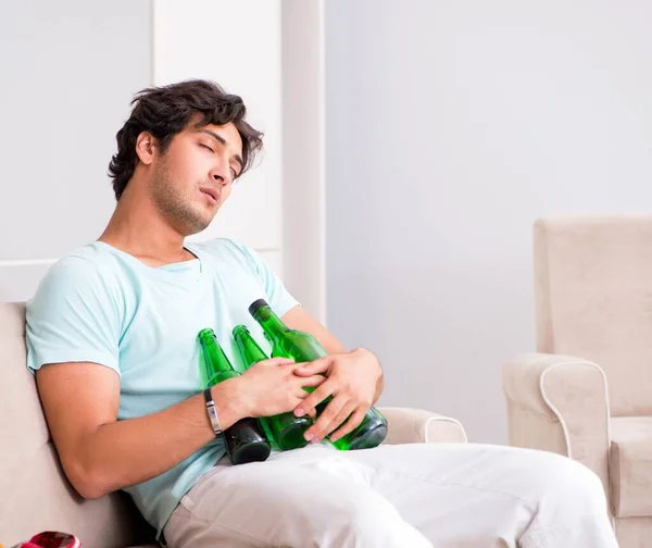 Young drunk handsome man after party at home — Stock Photo, Image