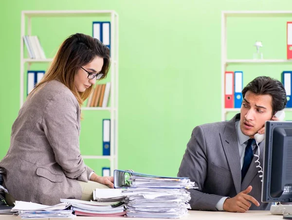 Two colleagues working in the office