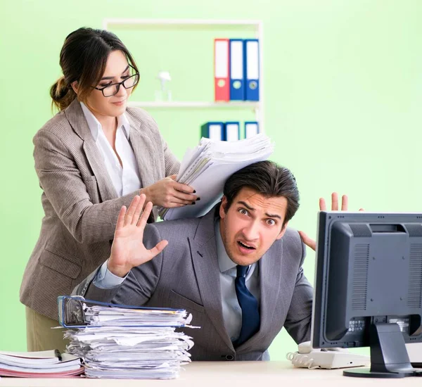 Man employee suffering from excessive work — Stock Photo, Image