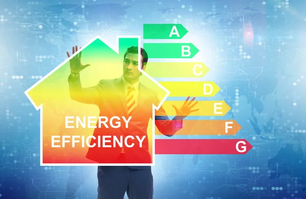 Empresario en concepto de eficiencia energética —  Fotos de Stock