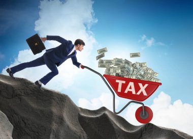 İşadamı, vergi parasıyla el arabası sürüyor.