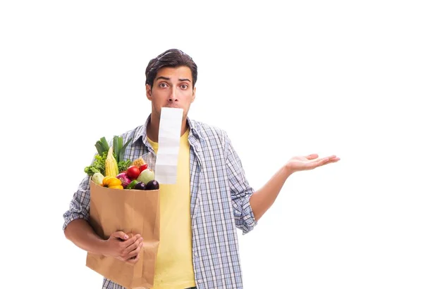 Joven con su tienda de comestibles en blanco —  Fotos de Stock