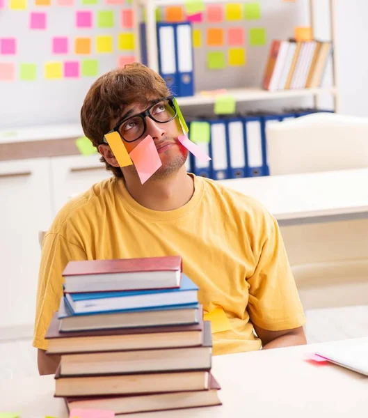 Student preparing for exams with many conflicting priorities — Stock Photo, Image