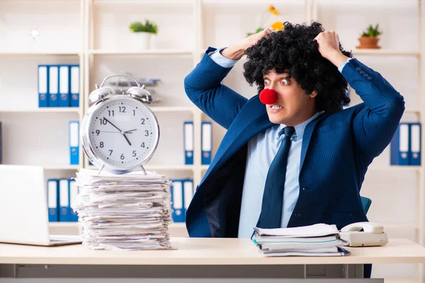 Young clown businessman working in the office — Stock Photo, Image