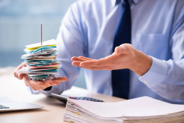 Young male employee in budget planning concept — Stock Photo, Image