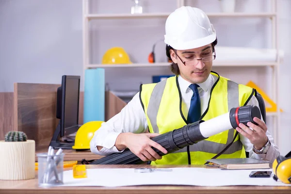 Young male architect working in the office — Stock Photo, Image