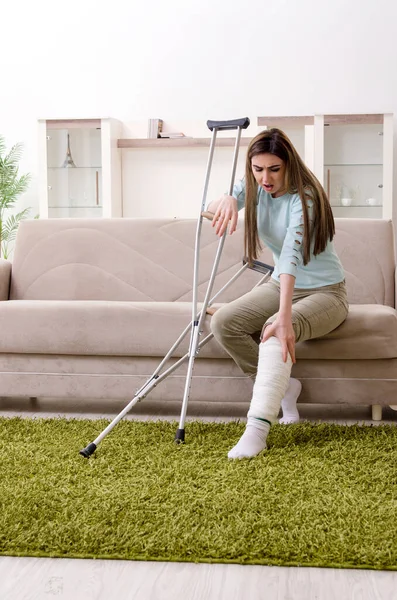 Young woman after car accident suffering at home — Stock Photo, Image