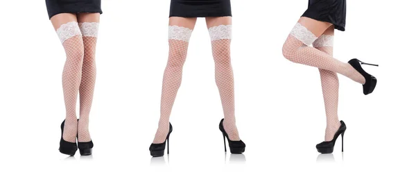 Donna gambe con calze su bianco — Foto Stock