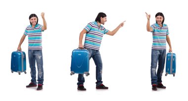 Genç adam beyaz bavullarla seyahat ediyor.