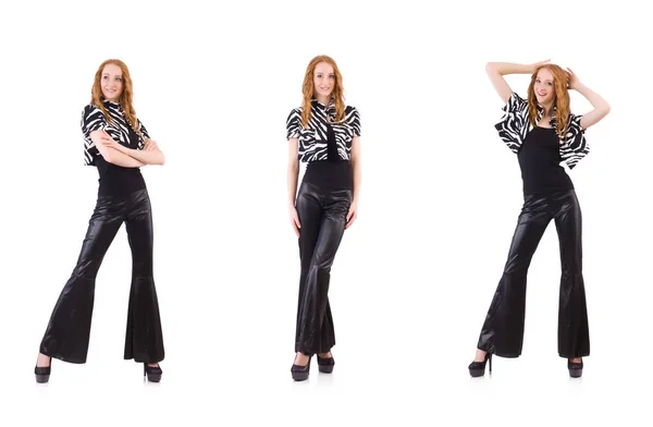 Femme rousse en bas de cloche noire pantalon sur blanc — Photo