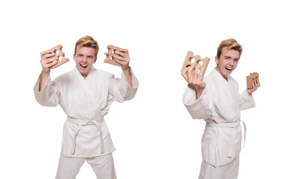 Hombre divertido karate romper ladrillos aislados en blanco — Foto de Stock