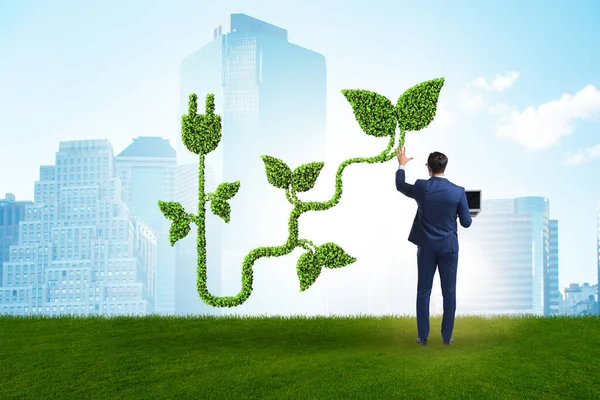 Green energy concept with businessman — Stock Photo, Image