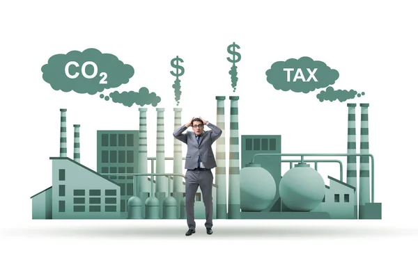 Zakenman in het concept van koolstofbelasting — Stockfoto