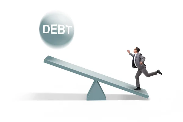 Έννοια του χρέους και του δανείου με επιχειρηματία και seesaw — Φωτογραφία Αρχείου