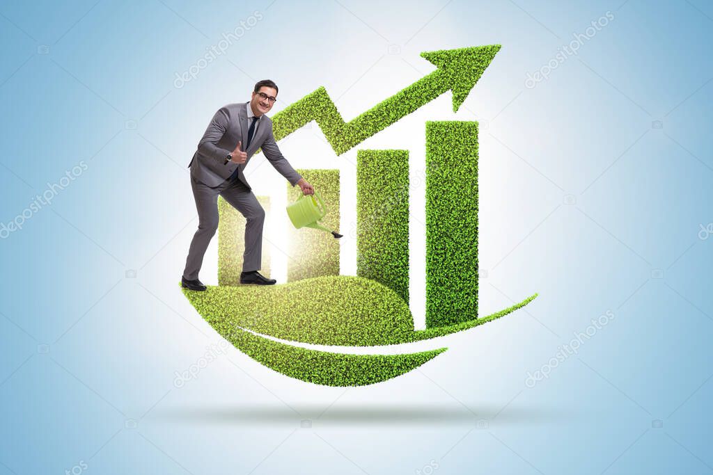 Businessman supporting green economy growth