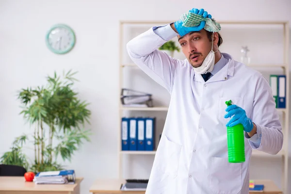 Young male doctor virologist in the office — Stock Photo, Image