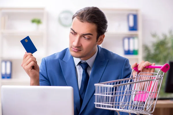 Young male businessman in ecommerce concept — Stock Photo, Image