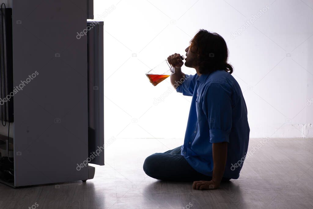 Young man suffering from alcoholism