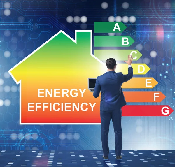 Empresario en concepto de eficiencia energética — Foto de Stock