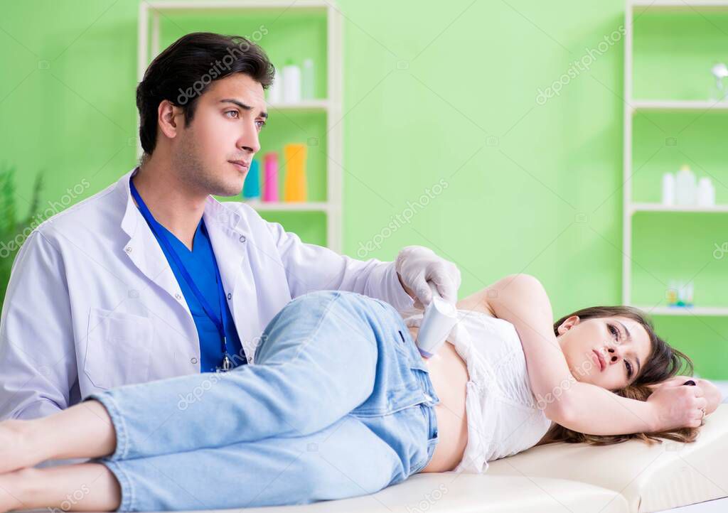 Pregnant woman visiting radiologyst for ultrasound