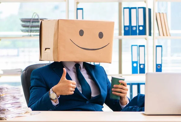 Happy man with box instead of his head — Stock Photo, Image