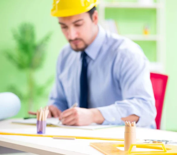 Young male architect working at the project — Stock Photo, Image