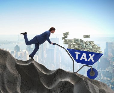 İşadamı, vergi parasıyla el arabası sürüyor.