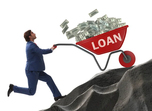 Businessman pushing wheelbarrow uphill in debt loan concept — Stock Photo, Image