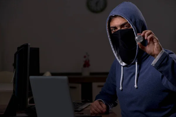 Male hacker hacking security firewall late in office — Stock Photo, Image