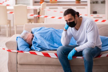 Baba ve oğul Coronavirus hastalığı konseptinde.