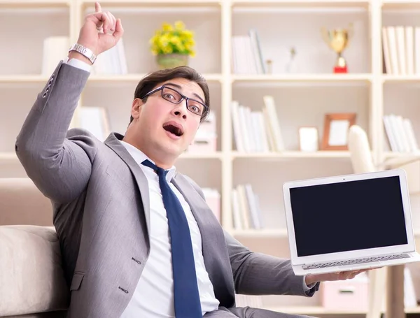 Businessman working on the floor at home — Stock Photo, Image