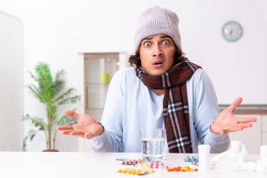 Genç adam evde grip olmuş.