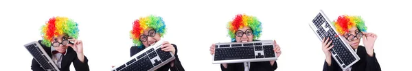 Lustiger Clown mit Tastatur auf Weiß — Stockfoto