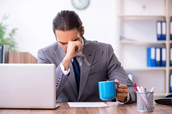 Unhappy male businessman in the office — Stock Photo, Image