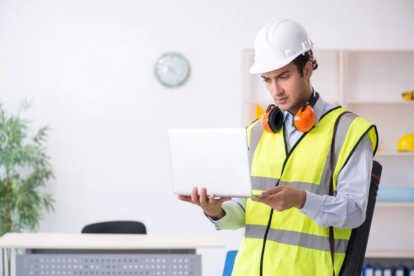 Young male architect working in the office — Stock Photo, Image