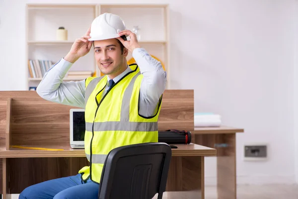 Young male architect working in the office — Stock Photo, Image