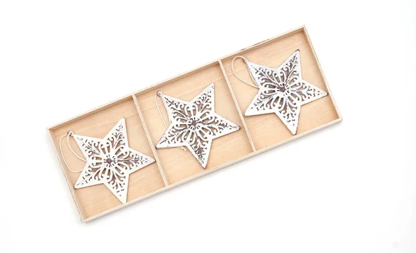 Christmas star decorations in the box — Stock Photo, Image