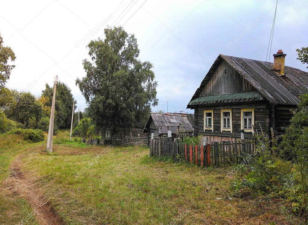 Landscape with an old rustic house