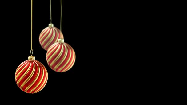 Three Christmas Balls Hanging On Ribbon On Black Background 4k