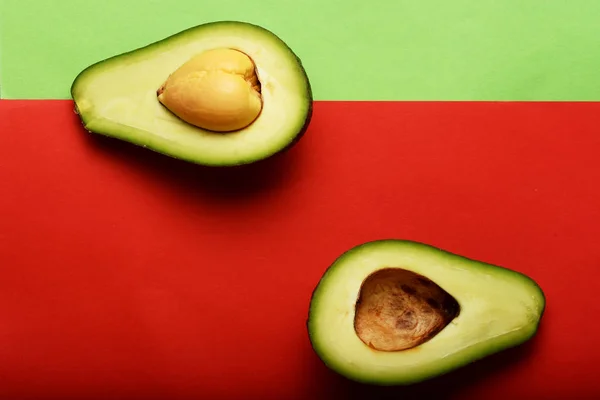 Close Van Avocado Gesneden Helft Voor Achtergrond — Gratis stockfoto