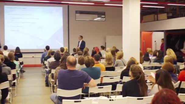 Audience listening speaker  in British school — Stock Video