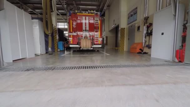 Fire engine in garage of fire station — Stock Video