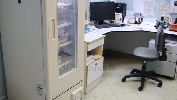 Workplace with refrigerator for packed frozen blood cells — Stock Video