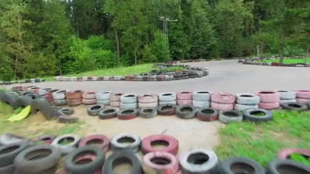 Racing track with many tyres on sides — Stock Video