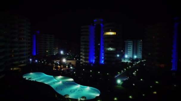 Illuminated complex My Marine Residence at night — Stock Video